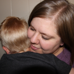 Image of mom and son hugging